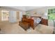 Large bedroom suite featuring trey ceiling, neutral walls, and dark wood furniture at 4608 Regency Dr, Durham, NC 27713
