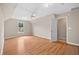 Spacious bedroom with wood-look floors and neutral paint at 4608 Regency Dr, Durham, NC 27713