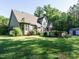 The home exterior features an above ground pool, a screened in porch, and mature landscaping at 49 Mount Joy Pl, Sanford, NC 27330
