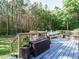 Outdoor pool deck features a seating area, storage and offers space for relaxing and enjoying the outdoors at 49 Mount Joy Pl, Sanford, NC 27330