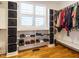 Walk-in closet with custom shelving, shoe storage, and organized hanging space under natural light at 49 Mount Joy Pl, Sanford, NC 27330