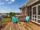 Back deck with chairs, grill, and fire pit perfect for backyard relaxation with nice neighborhood views at 506 Wildwood Ln, Graham, NC 27253