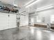 Spacious garage with high ceilings and plenty of room for parking and storage at 506 Wildwood Ln, Graham, NC 27253