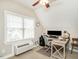 Cozy home office space with natural light and modern desk near two windows at 506 Wildwood Ln, Graham, NC 27253