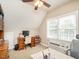 Bright office space with a large desk, multiple windows and two chairs at 506 Wildwood Ln, Graham, NC 27253