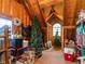 Finished attic used for storage, with Christmas decorations, and organized boxes at 506 Wildwood Ln, Graham, NC 27253