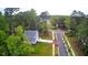 Aerial view of new construction home showcasing landscaped yard, fresh construction, and neighborhood at 509 Olive Branch Rd, Durham, NC 27703