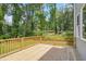 Spacious back deck overlooking a private, wooded backyard at 509 Olive Branch Rd, Durham, NC 27703