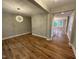 Bright dining room with hardwood floors and modern lighting at 509 Olive Branch Rd, Durham, NC 27703