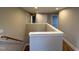 Upstairs hallway featuring white trim and neutral walls, providing access to various rooms in the home at 509 Olive Branch Rd, Durham, NC 27703