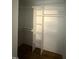 Organized walk-in closet with built-in shelving and hanging rods, providing ample storage solutions at 509 Olive Branch Rd, Durham, NC 27703
