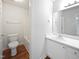 Clean bathroom with a shower-tub combo, single sink vanity, and great storage space at 5612 Tealbrook Dr, Raleigh, NC 27610