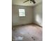 Bedroom with a window letting in natural light at 601 Crestview Dr, Durham, NC 27712