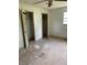 Bedroom with ceiling fan and two closets offering ample storage space at 601 Crestview Dr, Durham, NC 27712