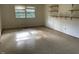 Open-concept living space with window and shelving, a blank canvas ready for your vision at 601 Crestview Dr, Durham, NC 27712