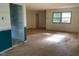 Spacious living room with natural light, ready for personalization and decor at 601 Crestview Dr, Durham, NC 27712