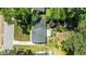 Aerial view of the home's roof, deck, garden and backyard landscaping at 612 Harvest Ln, Raleigh, NC 27606