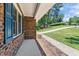 View of the brick home's exterior with a well-kept walkway at 612 Harvest Ln, Raleigh, NC 27606