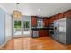 Modern kitchen with stainless steel appliances and beautiful countertops at 612 Harvest Ln, Raleigh, NC 27606