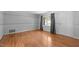 Spacious living room featuring hardwood floors and ample natural light at 612 Harvest Ln, Raleigh, NC 27606