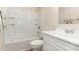 Clean bathroom featuring a tub/shower combo and a white vanity with ample storage space at 6225 Jones Farm Rd, Wake Forest, NC 27587