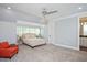 Comfortable bedroom with plush carpet, a queen bed, and plenty of natural light at 6502 New Market Way, Raleigh, NC 27615