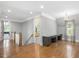 Spacious bonus room with hardwood floors, built-in desk, and ample natural light at 6502 New Market Way, Raleigh, NC 27615