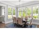 Elegant dining room bathed in natural light, offering ample space and a cozy atmosphere at 6502 New Market Way, Raleigh, NC 27615