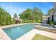 Enjoy the spacious swimming pool with a built-in spa, perfect for recreation and relaxation at 6502 New Market Way, Raleigh, NC 27615