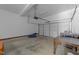 A functional two car garage with concrete floor at 6513 Cablewood Dr, Raleigh, NC 27603