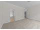 Spacious main bedroom with neutral carpet with doorway views into the main bathroom and walk-in closet at 6513 Cablewood Dr, Raleigh, NC 27603
