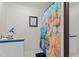 Bathroom with colorful shower curtain and neutral walls at 6517 Hidden Pond Rd, Wendell, NC 27591