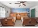 A bedroom with twin beds featuring a mural and neutral decor at 6517 Hidden Pond Rd, Wendell, NC 27591