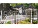 The home's exterior features a charming gazebo and deck, perfect for outdoor entertaining and relaxation at 6517 Hidden Pond Rd, Wendell, NC 27591
