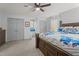 Main bedroom features ensuite, plush carpets, and built-in wardrobe at 6517 Hidden Pond Rd, Wendell, NC 27591