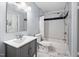 Stylish bathroom with subway tile, updated vanity, and modern fixtures at 6565 New Market Way, Raleigh, NC 27615