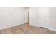 Bright room with modern flooring and views to the hall at 680 Winesap Dr, Graham, NC 27253