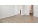 Bright room with modern flooring, with views to the hall and bathroom at 680 Winesap Dr, Graham, NC 27253