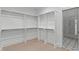 Well-organized walk-in closet offering abundant storage solutions at 702 Wimbleton Dr, Raleigh, NC 27609
