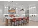 Gourmet kitchen featuring custom cabinets, marble countertops, stainless steel appliances, and a large island at 702 Wimbleton Dr, Raleigh, NC 27609