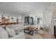 Open living room featuring a modern design, stylish furniture, and plenty of natural light at 702 Wimbleton Dr, Raleigh, NC 27609