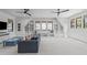 Cozy living room with window seats, built-in shelves, and comfortable seating at 702 Wimbleton Dr, Raleigh, NC 27609