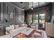 Sophisticated living room with dark walls, a marble coffee table, and modern decor at 702 Wimbleton Dr, Raleigh, NC 27609