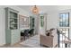 Inviting living space with built-in bookshelves, work area, and comfortable seating at 702 Wimbleton Dr, Raleigh, NC 27609