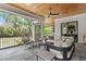 Relaxing outdoor living space features a cozy seating area and scenic views at 702 Wimbleton Dr, Raleigh, NC 27609