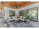 Stylish outdoor living area featuring a comfortable seating arrangement and serene views at 702 Wimbleton Dr, Raleigh, NC 27609