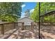 A backyard with deck and detached garage at 717 Fairfield St, Burlington, NC 27215