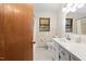 Bathroom featuring tiled floors, white vanity, and a shower/tub combo at 717 Fairfield St, Burlington, NC 27215