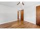 This bedroom offers hardwood floors and ceiling fan lighting at 717 Fairfield St, Burlington, NC 27215