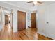A charming bedroom with hardwood floors and closet space at 717 Fairfield St, Burlington, NC 27215
